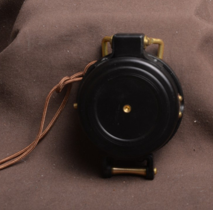 two lensatic compasses one with box