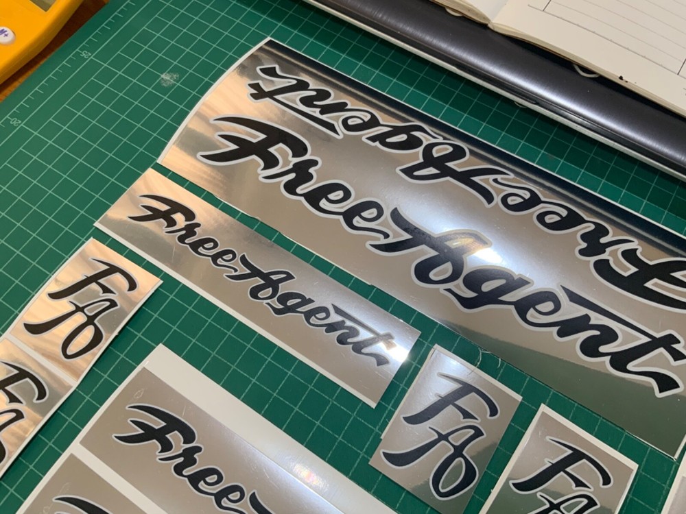 Free agent backing with chrome BMX sticker decals