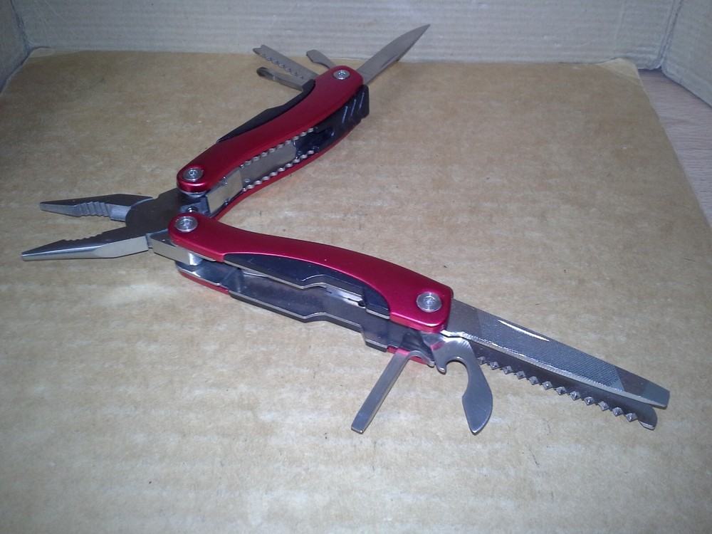 Switzerland Red Multitool Folding Pocket Pliers. VGC