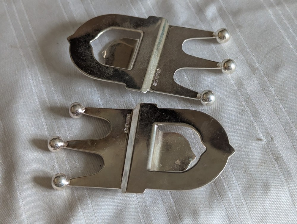 Neiman Marcus pair silver plated crown bottle openers