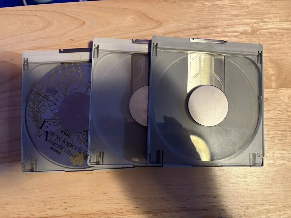 Three Apple CD Caddy’s Macintosh