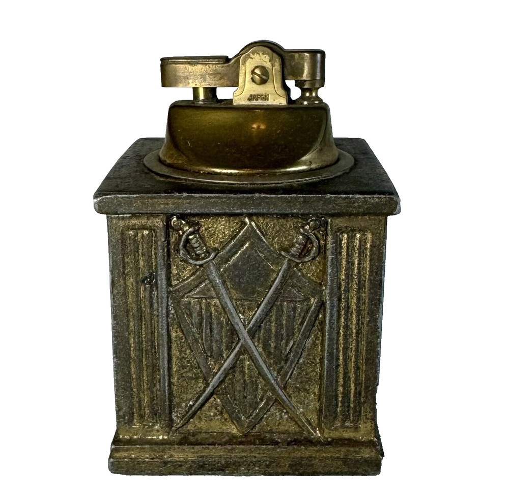 Brass Table lighter with crest/ rifle & sword motif