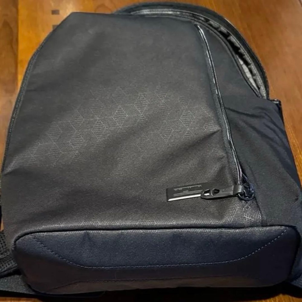 TUMI geometric pattern black backpack