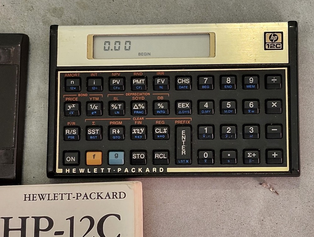 2 Hewlett Packard HP-12C Financial Calculator + Handbook