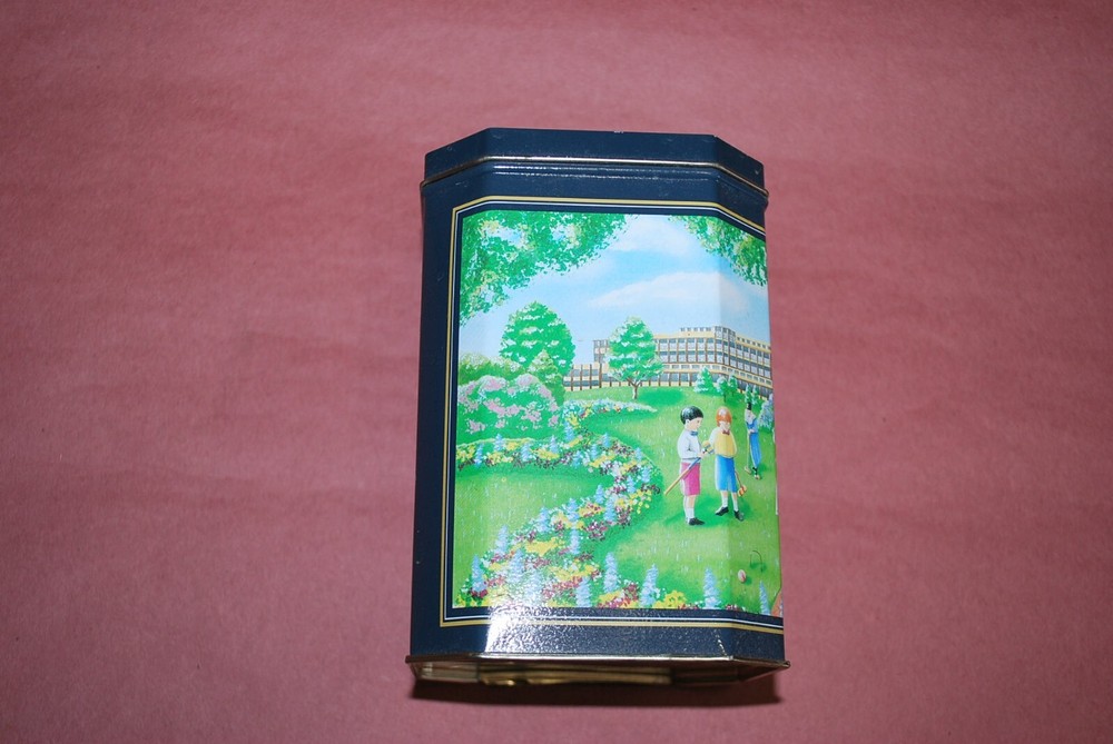 Vintage Hershey's Hugs Tin Can 6.5" tall