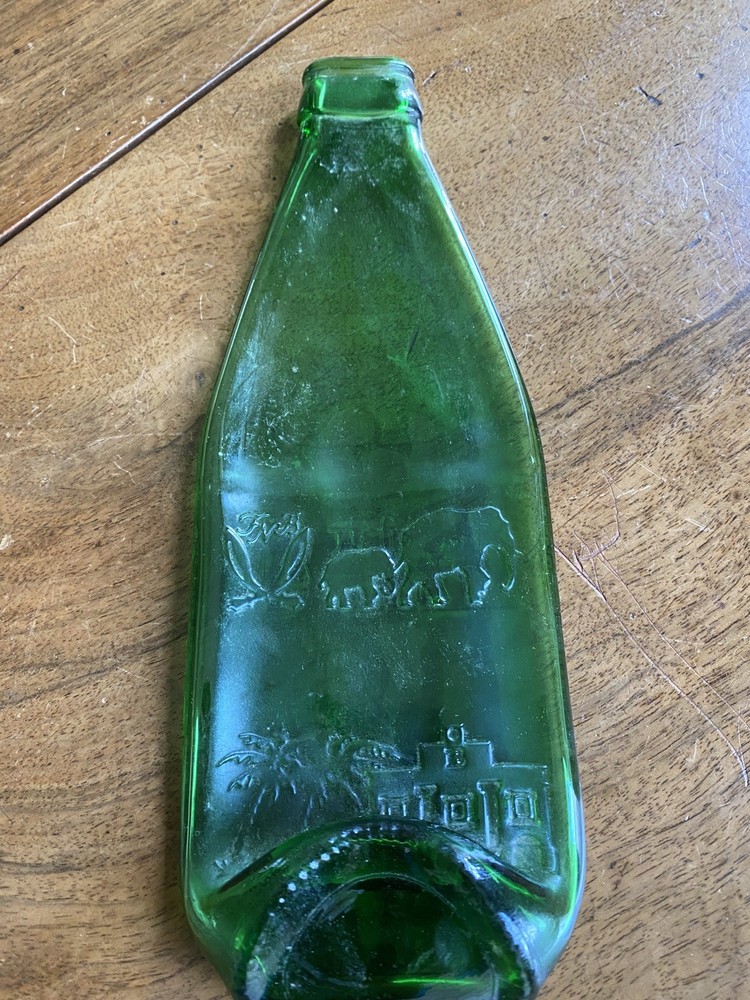 Squashed Green Glass Bottle 23 cms Long with Oriental Design