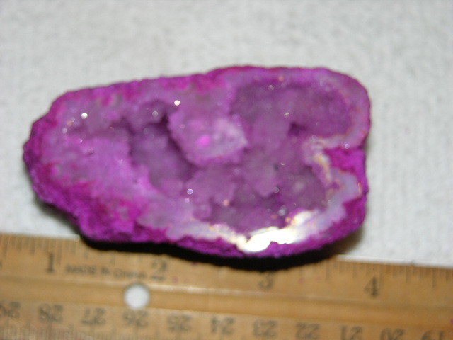 Geode cut & polished half with colored crystal center 3 inch E48