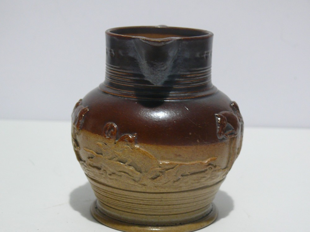 19TH CENTURY STONEWARE HUNTING JUG