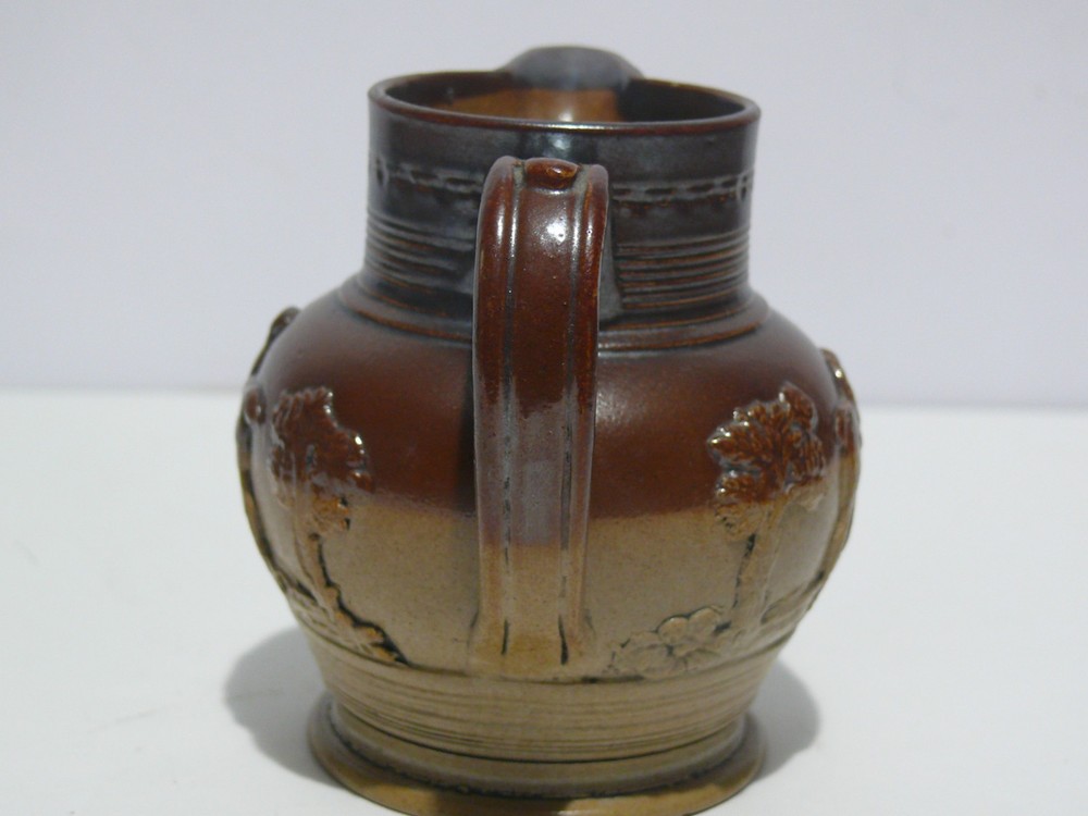 19TH CENTURY STONEWARE HUNTING JUG