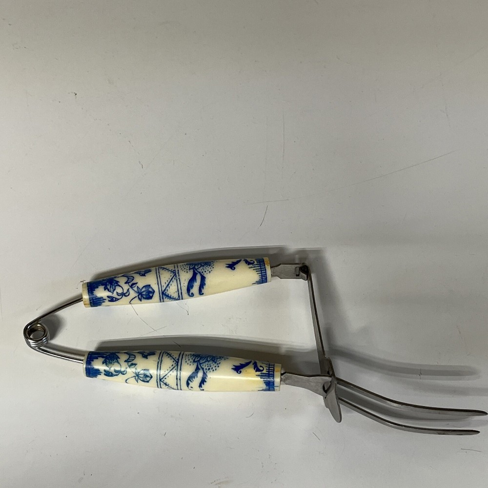 Bakelite White Blue Floral Spring Action Meat Serving Fork Slider