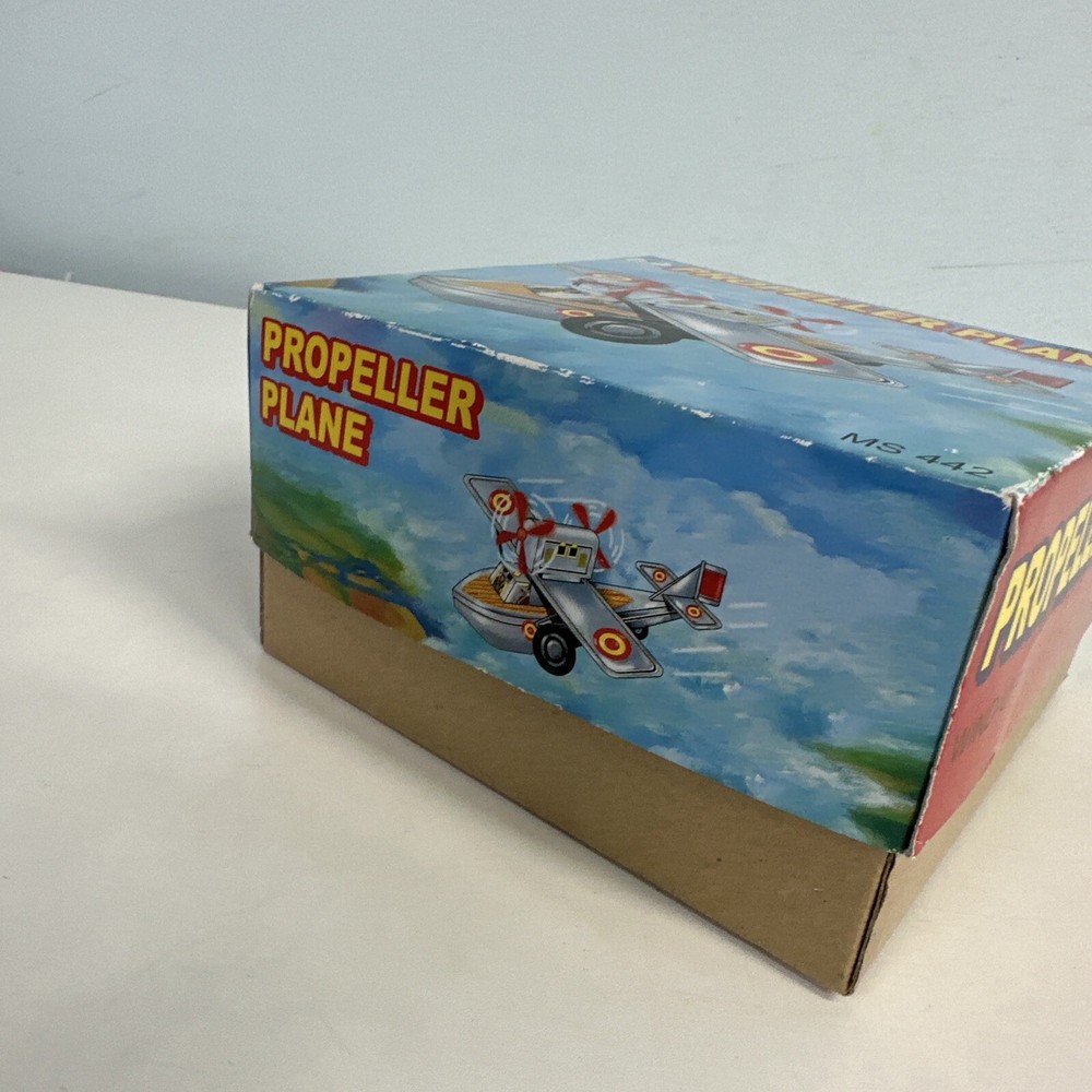Supt Propeller Plane (We could not get this to work) Small Tin plane