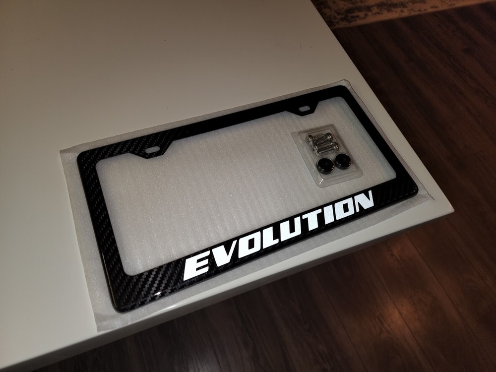 Reflective White Lacer Evo / Evolution 100% Carbon Fiber License Plate Frame
