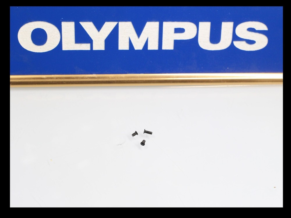 208932 OLYMPUS OMPC BOTTOM COVER SCREWS 1 SET QUANTITY (3) SCREWS USED OM-PC