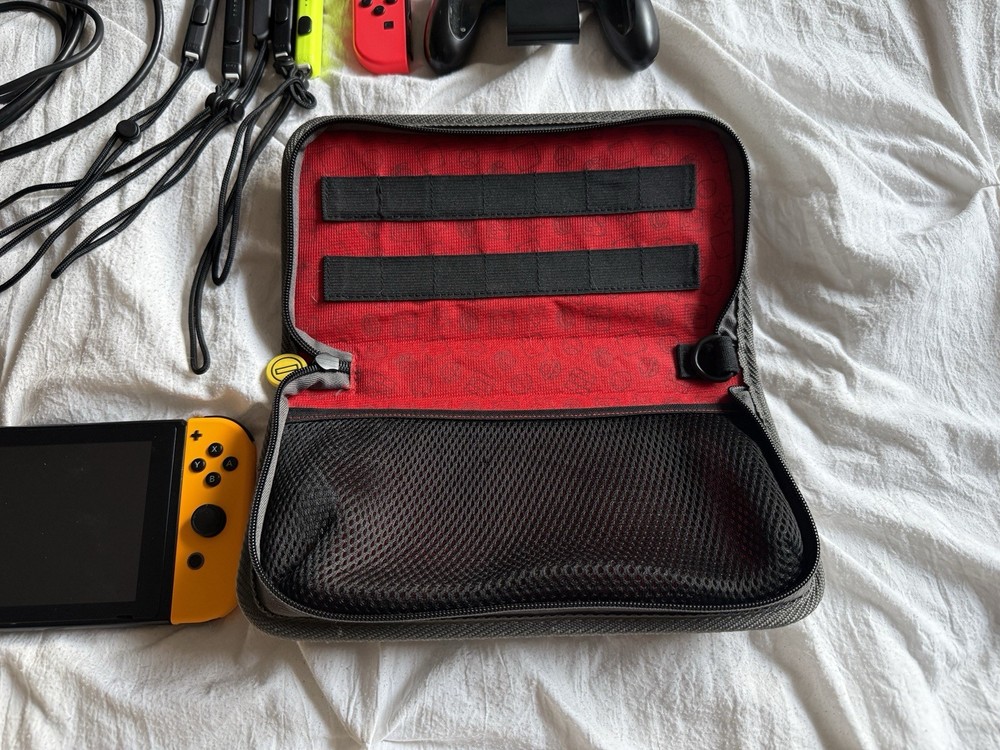 Nintendo Switch Bundle with Extra Joy-Con, Case, Dock, Cables, & Straps