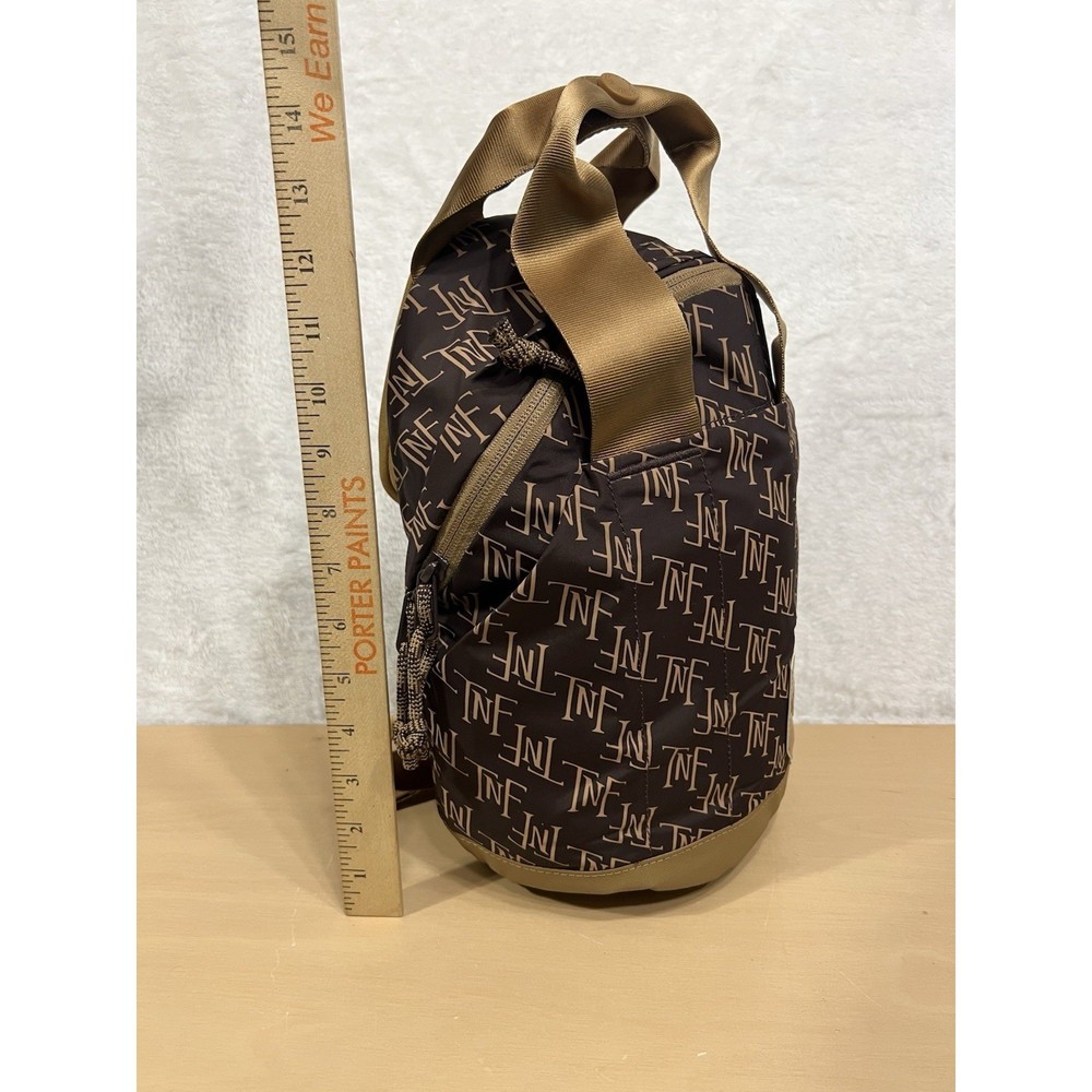 The North Face Never Stop Mini Backpack 5L Brown Tan Monogram NF0A81DV