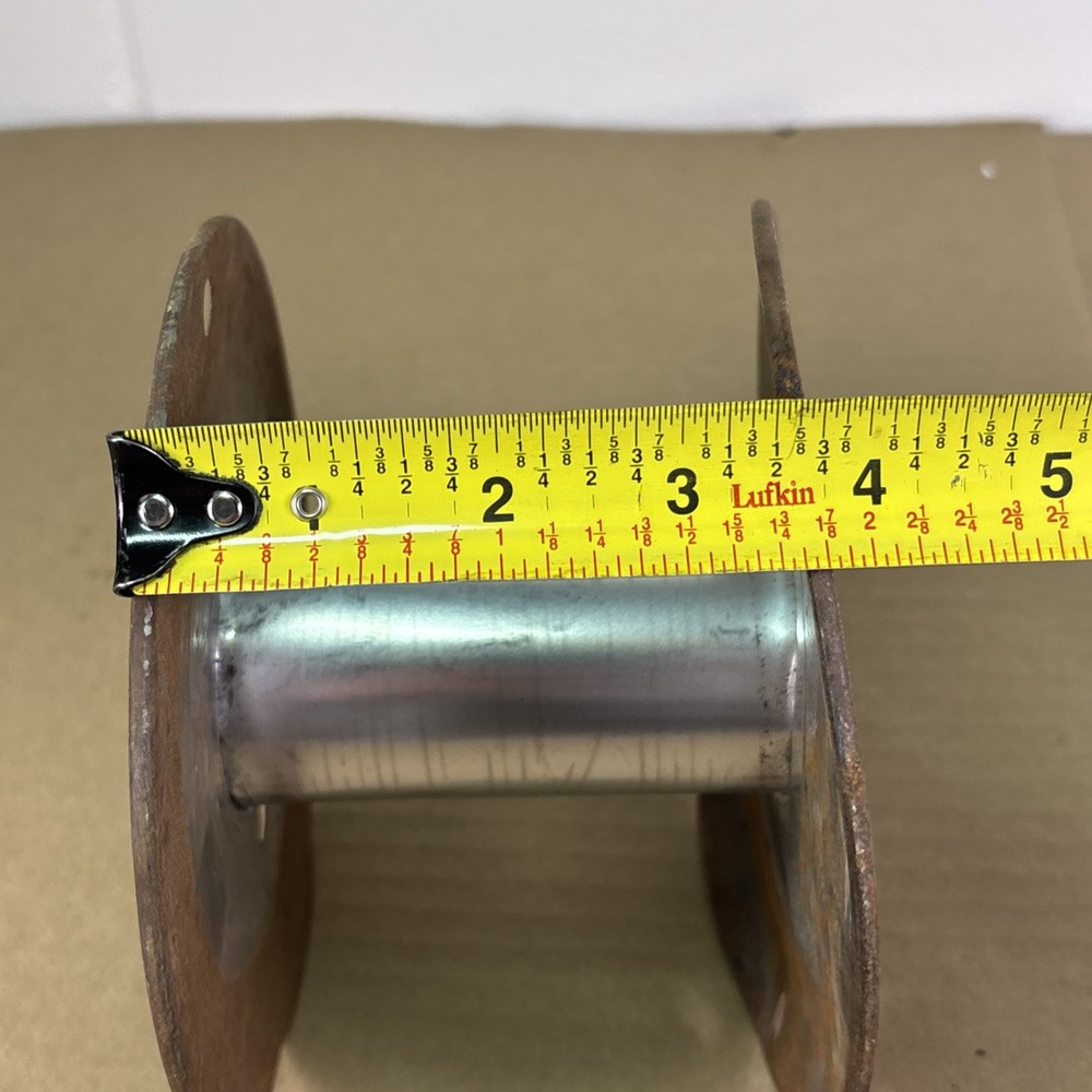 Empty Metal Woods Wire Spool Rusted and Bent Slightly