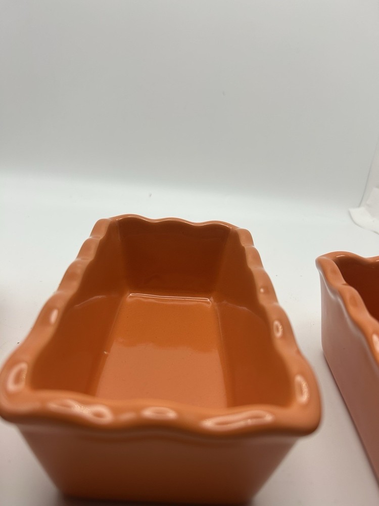 3 Stoneware Loaf Pans With Scalloped Edges.