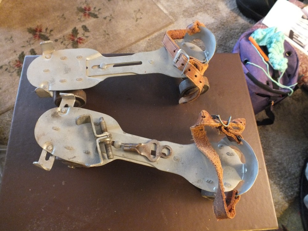 antique roller skates a pair