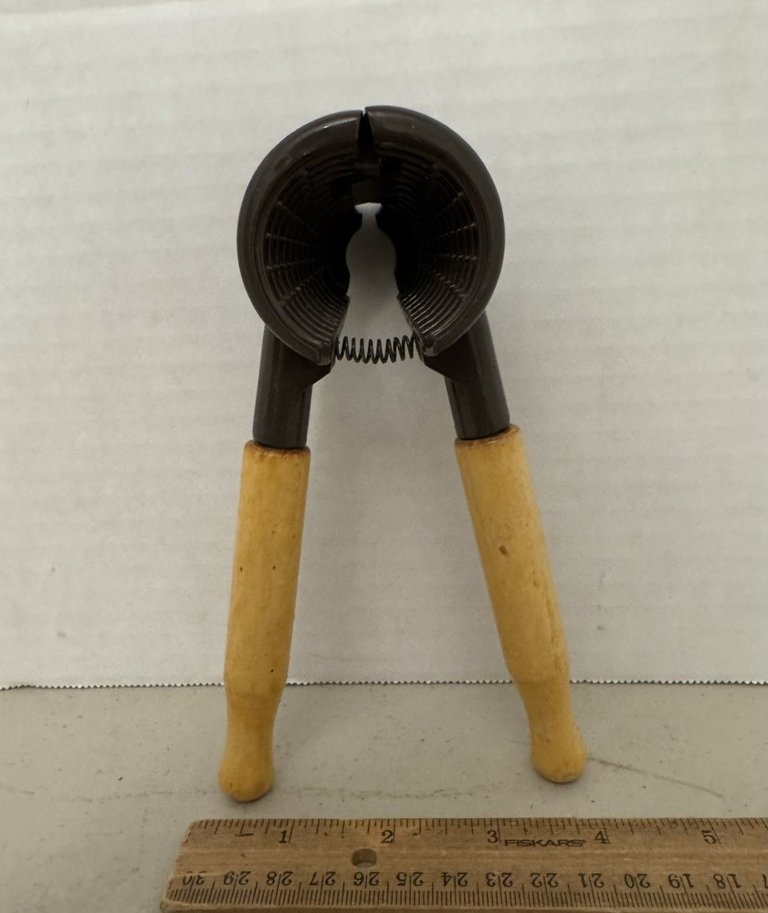 Multifunction 2 in One Tool....Nut Cracker and Bottle Opener