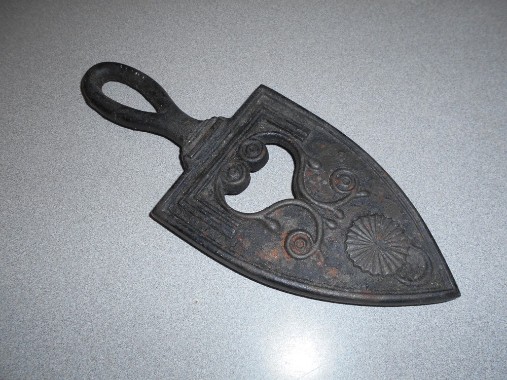Clothes iron footed trivet vintage cast iron pre owned