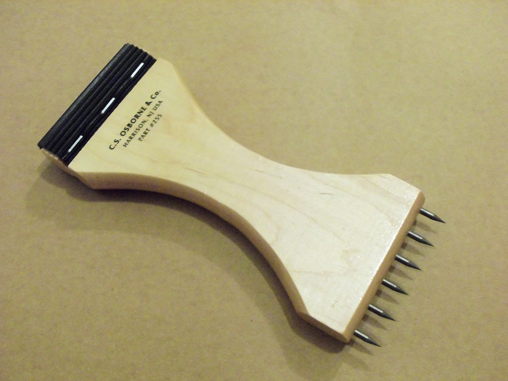 C.S. Osborne #255 Webbing Stretcher With Rubber End
