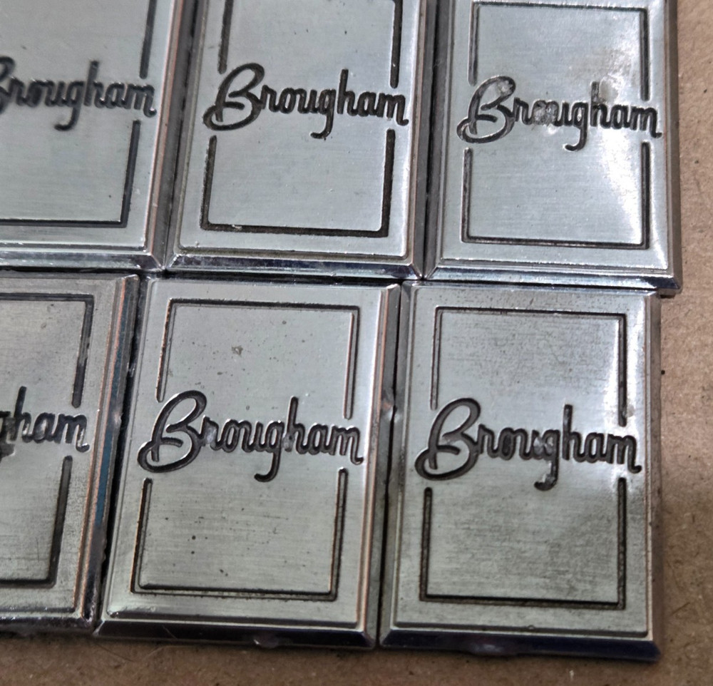 (2) OLDSMOBILE BROUGHAM CIRCA '80S SAIL PANEL EMBLEMS 1" (5604}