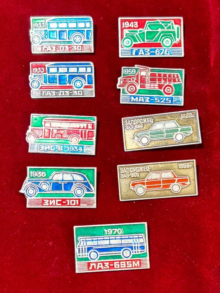 Nine antique model car pins. Russian.