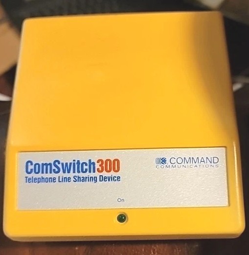 ComSwitch 300 Telephone Line Sharing Device, Command Communications
