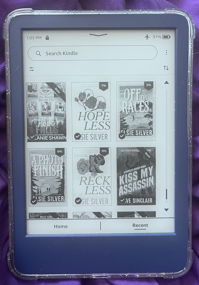 Amazon Kindle ereader Blue with books