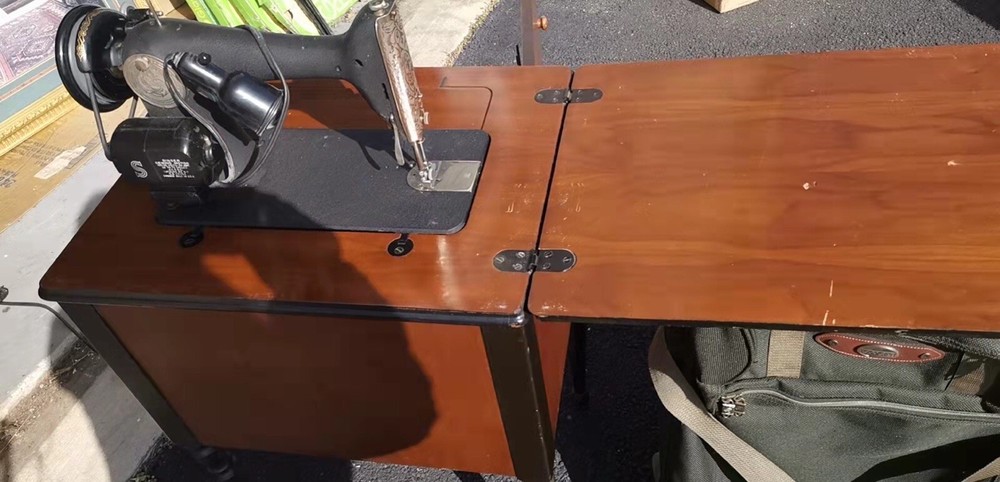 Old Singer Sewing Machine With Its Own Table