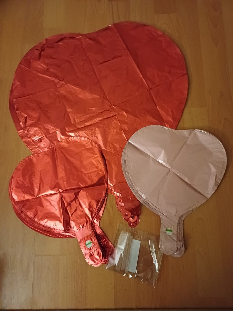 Foil balloons 30 pink small 20cms,29 red small 20cm and 10 red large 40 cm