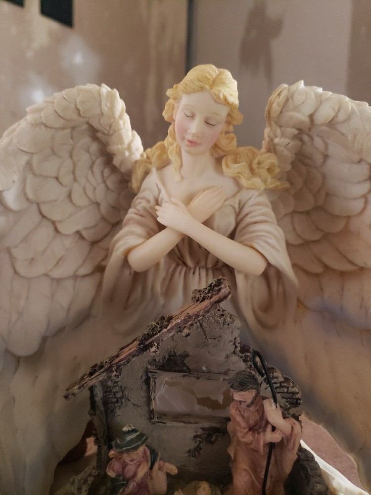 Sculptured Angel Night Light With Nativity Scene