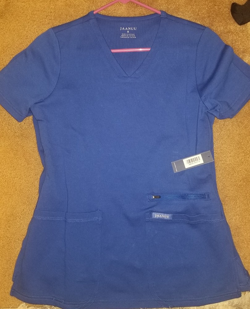 2 tops/ 1 bottom scrubs new size small