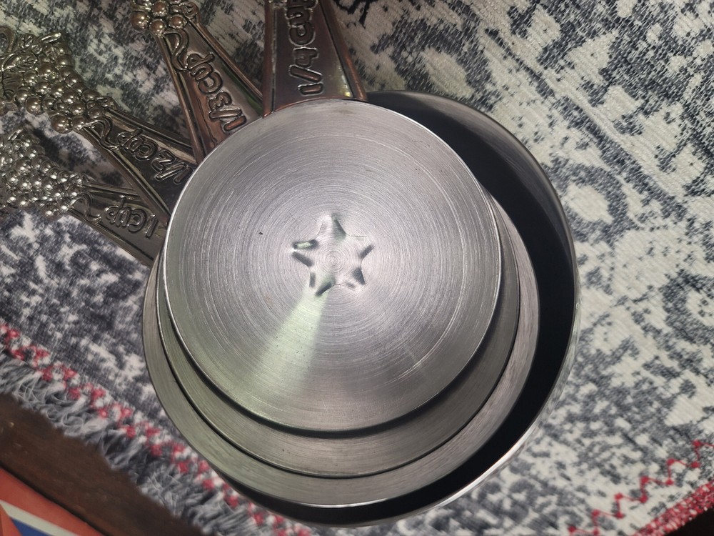 antique measuring cups and spoons