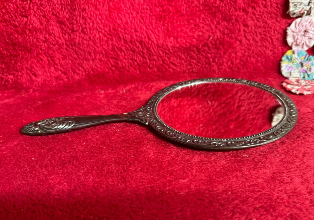 Vtg Vanity Hand Mirror with Decorative Raised Design