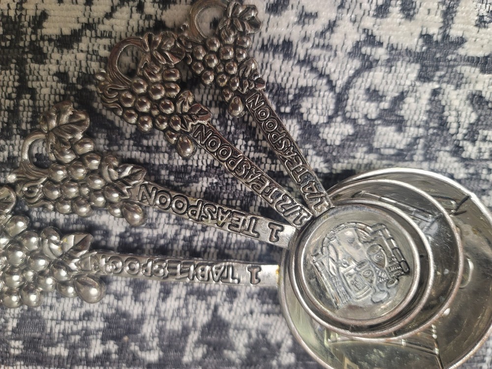 antique measuring cups and spoons