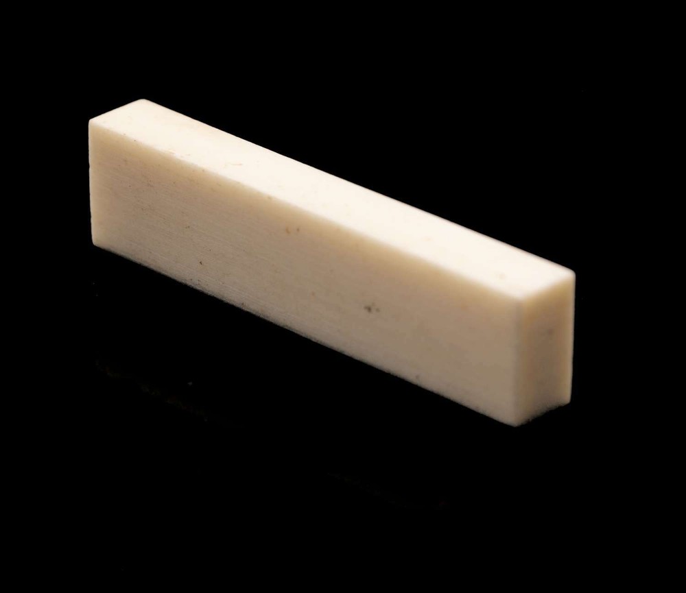 Tone Ninja Genuine Bone Nut Blank, Unbleached 1/4" thick NUT-NU23