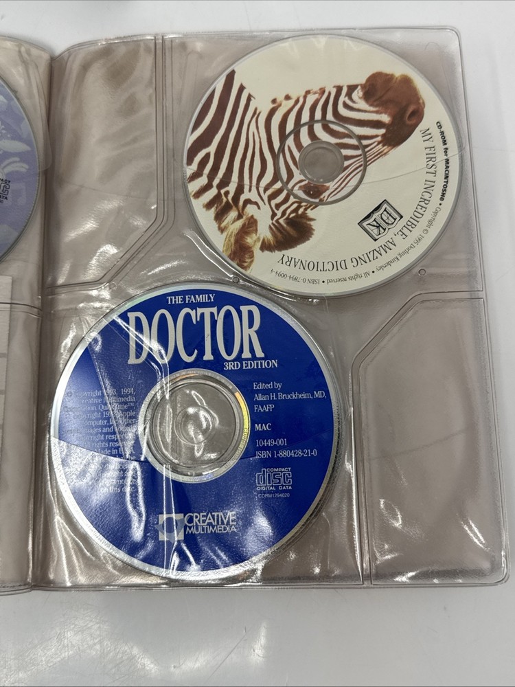 Vintage Macintosh 1990s CD-ROM Compact Discs Folder with 7 Discs