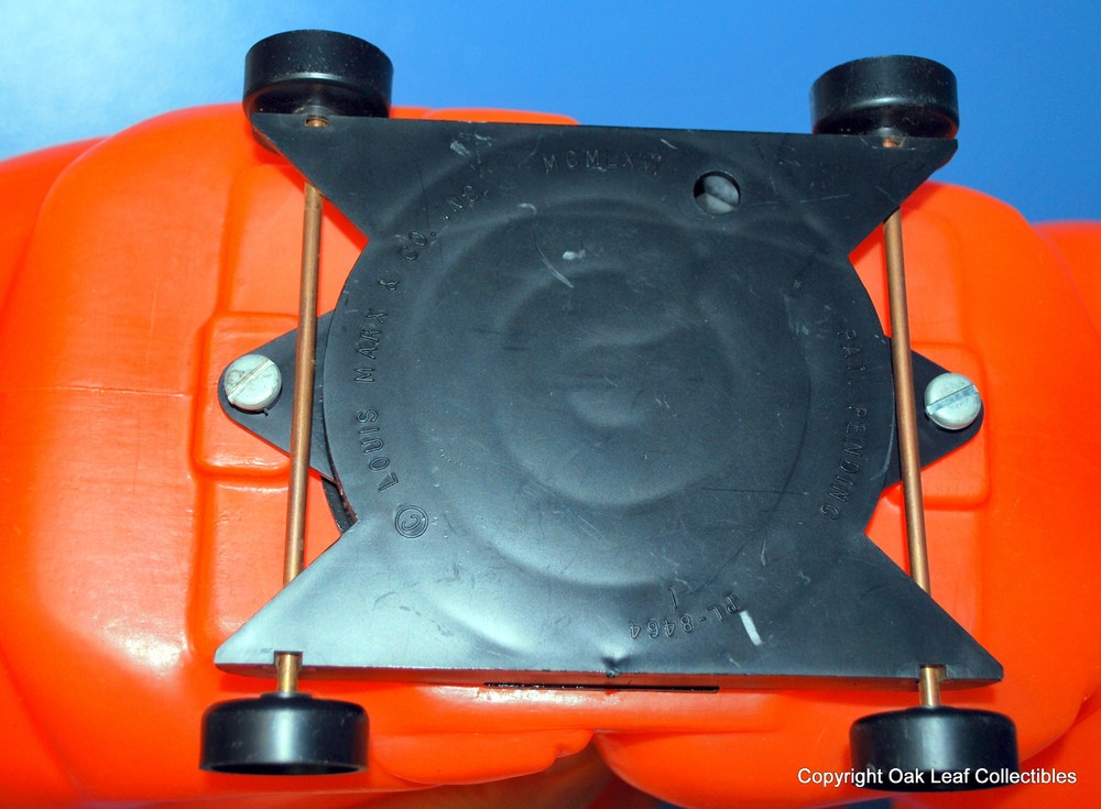 Marx PIG Pull Toy 1966 - Semi soft plastic Orange. Grunts when squeezed. RARE!