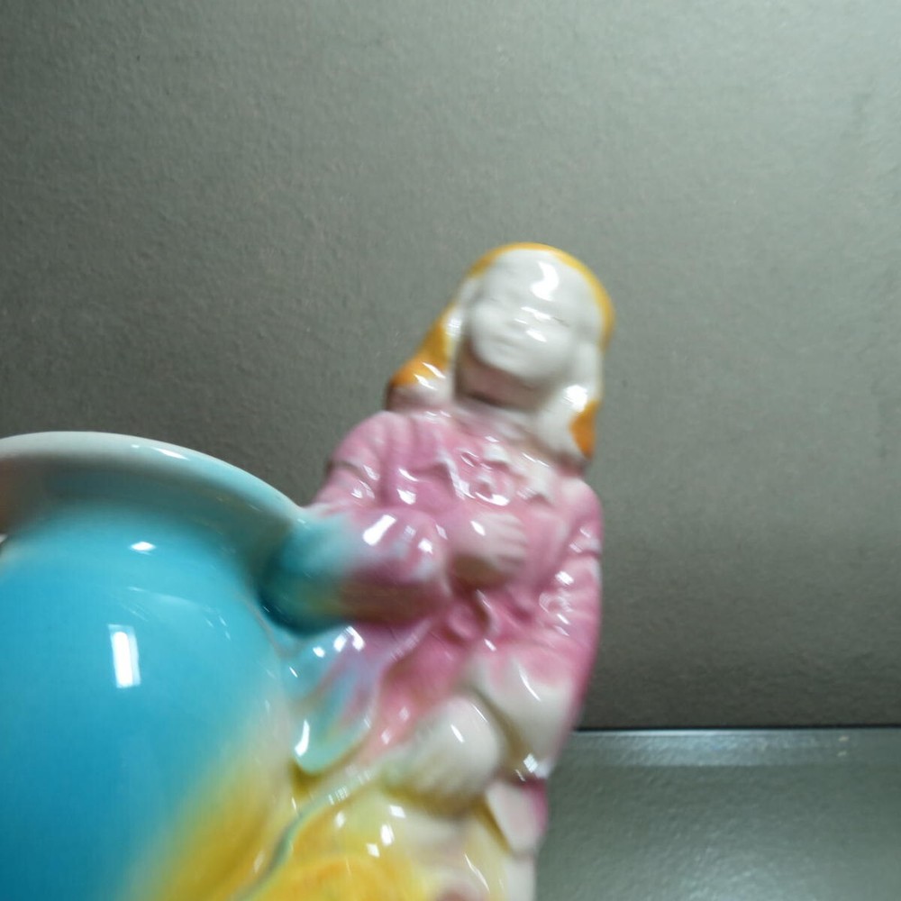 Plume hatted gentleman vintage planter bowing