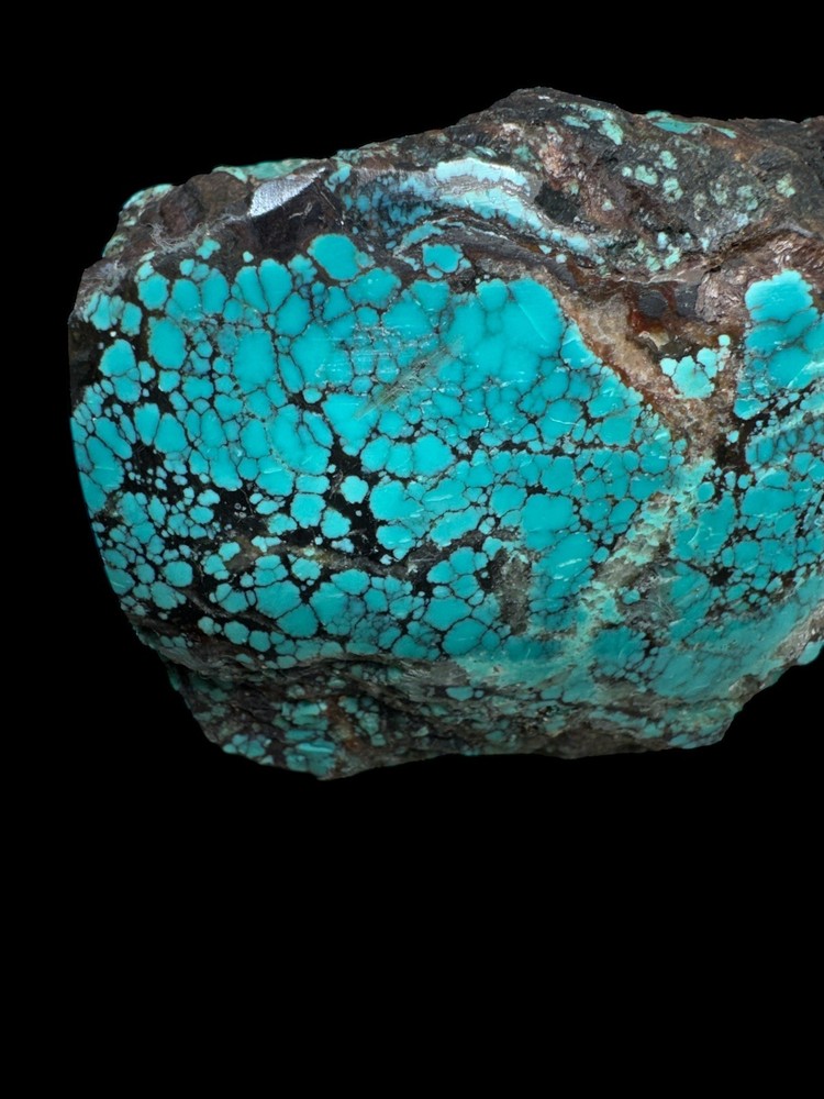 Hubei turquoise stabilized nugget solid spiderwebs all the way through