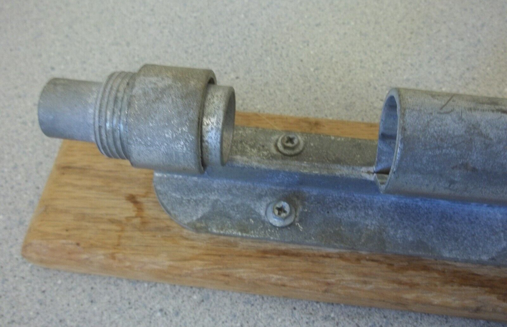 Nutcracker with red handle knob on wooden base Vintage adjustable nutcracker