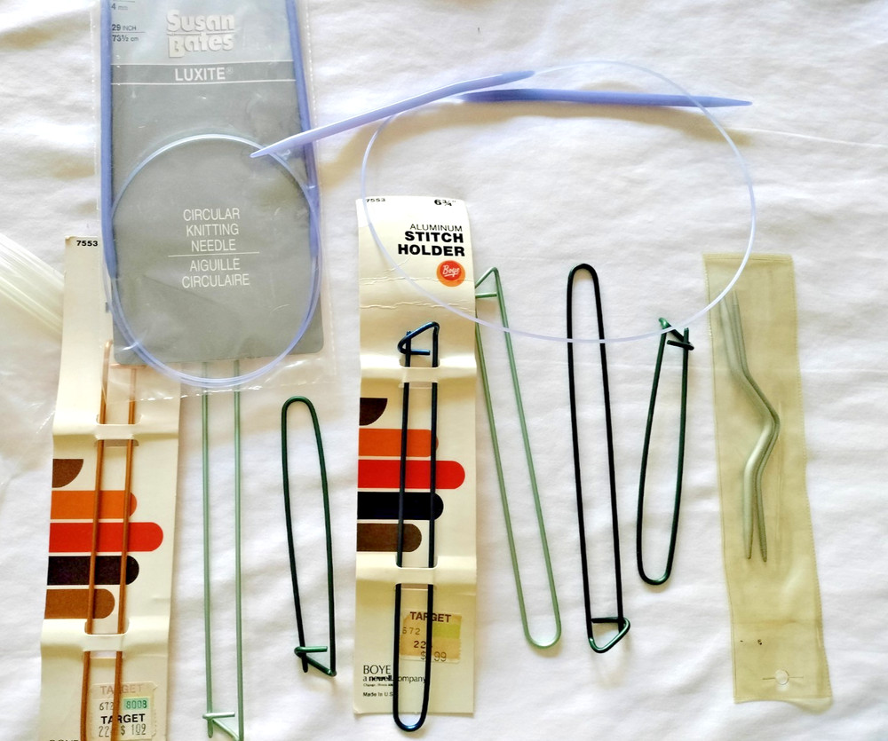 2 circluar knitting needles & 9 stitch holders