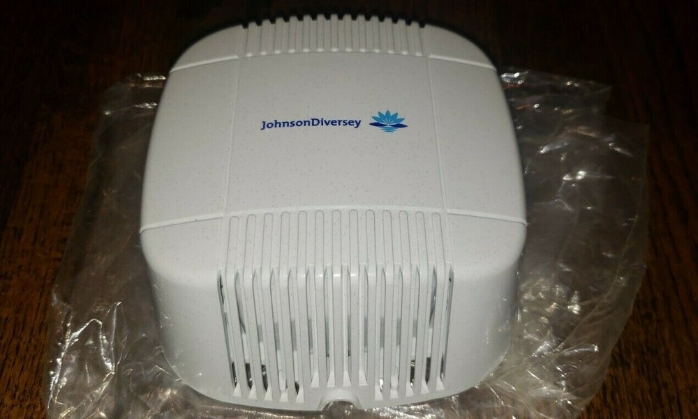 New Johnson Diversey 3039947 Automatic Urinal Drip Dispenser
