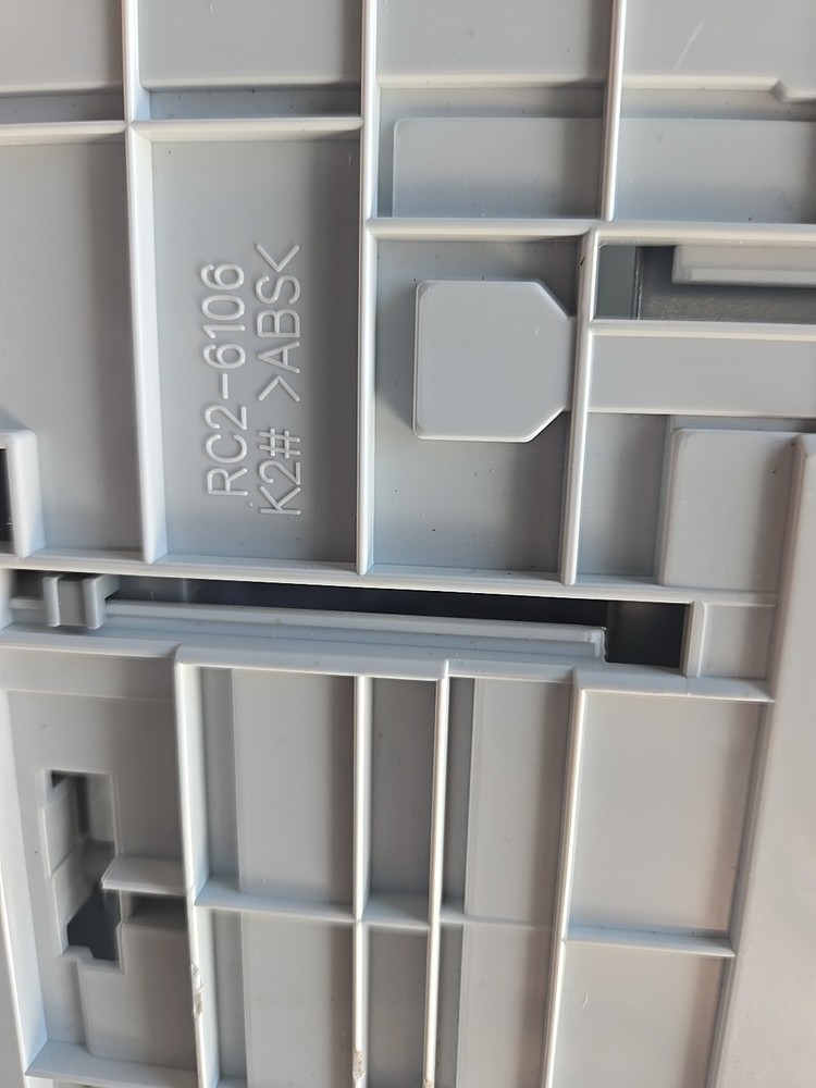 This is a genuine HP RC2-6106 sheet paper input tray for a printer. 