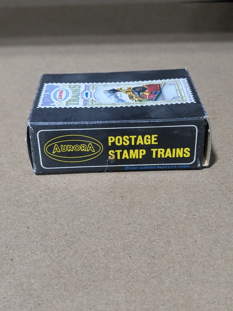 Aurora Postage Stamp Trains - #4982 - 12 Post Terminal Board - NEW/MINT
