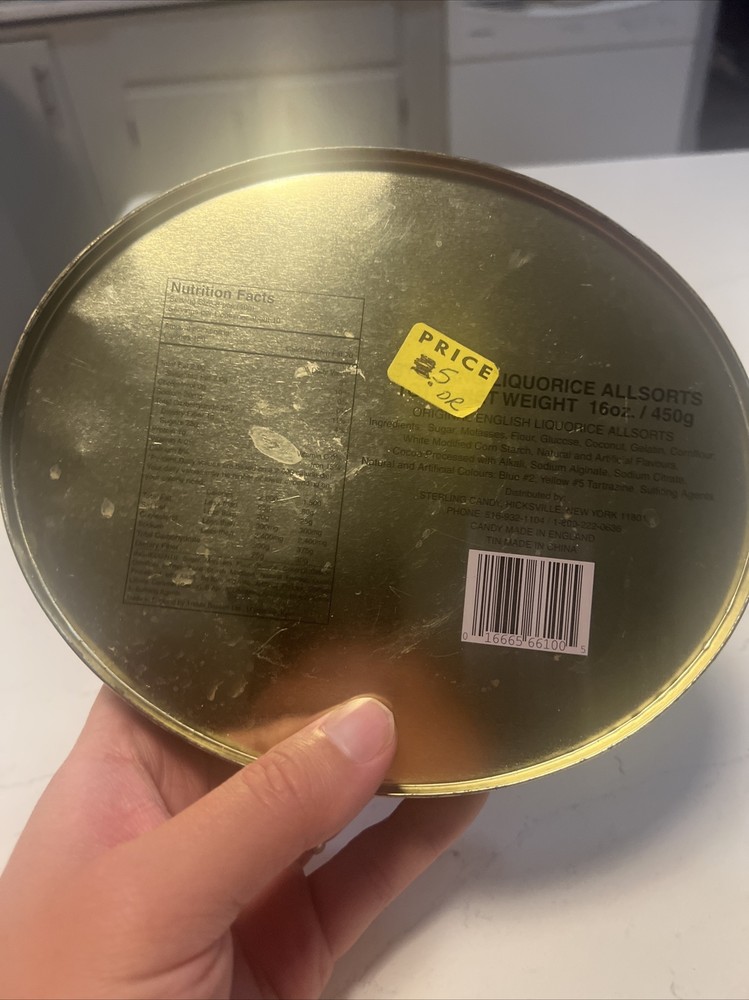 Black oval candy tin 8” long 6” wide 2”