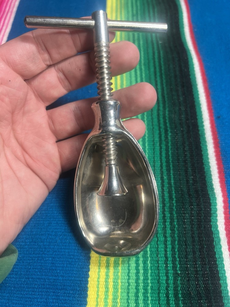 Vintage nut cracker Cast Iron T Handle Screw Shell Design