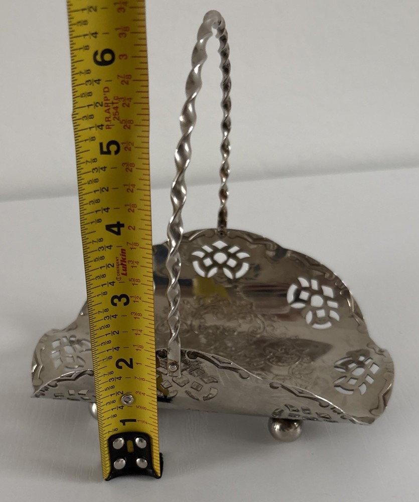 Silvertone metal basket handle w cut outs.