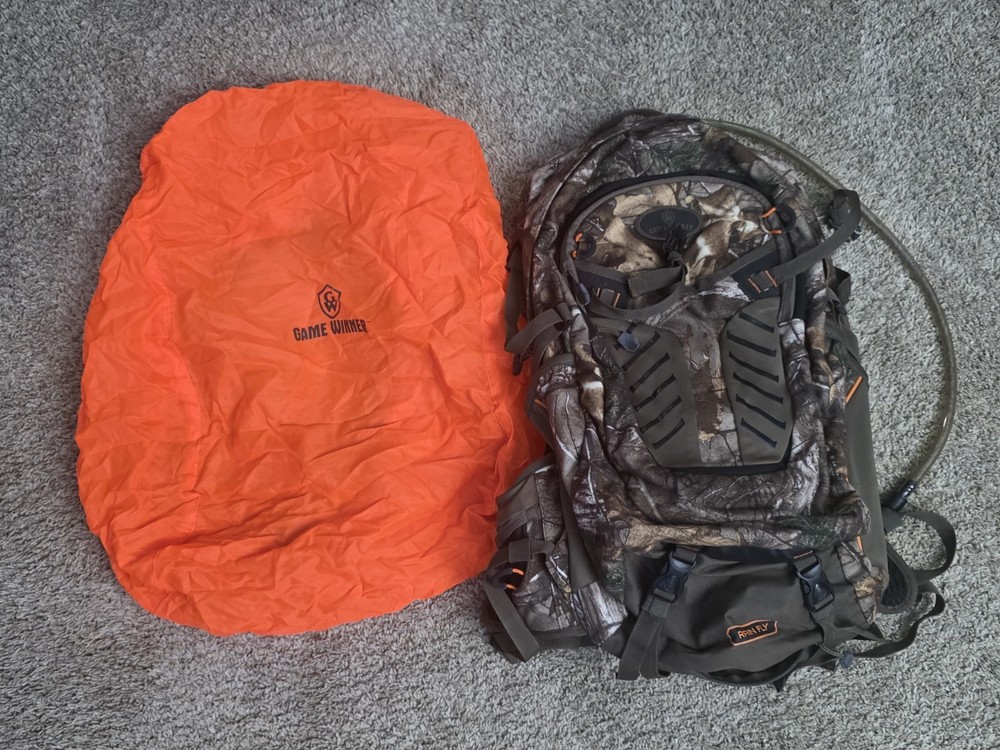 Game Winner Camouflage Hydration Backpack Tons of pockets. Rain Fly